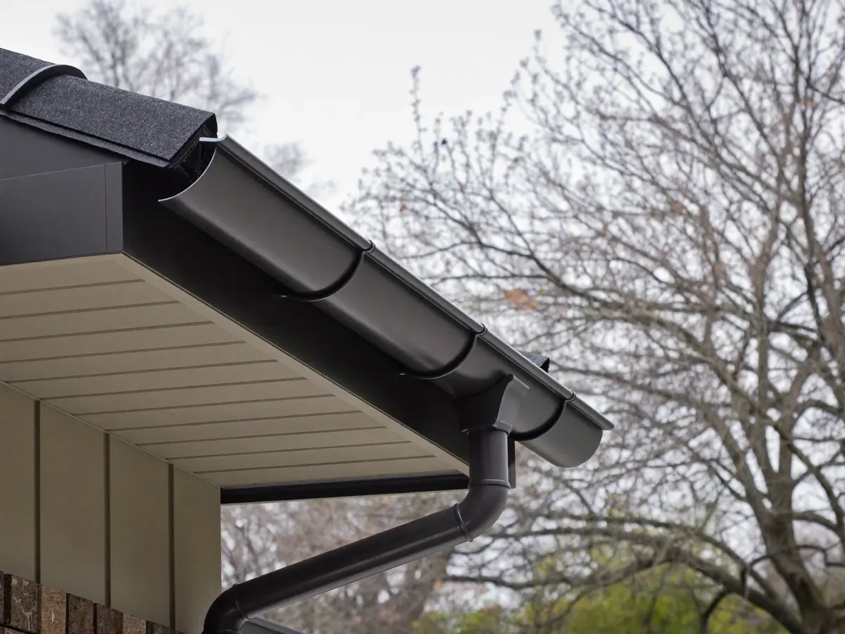 New seamless gutters along the roof edge of a Triangle home