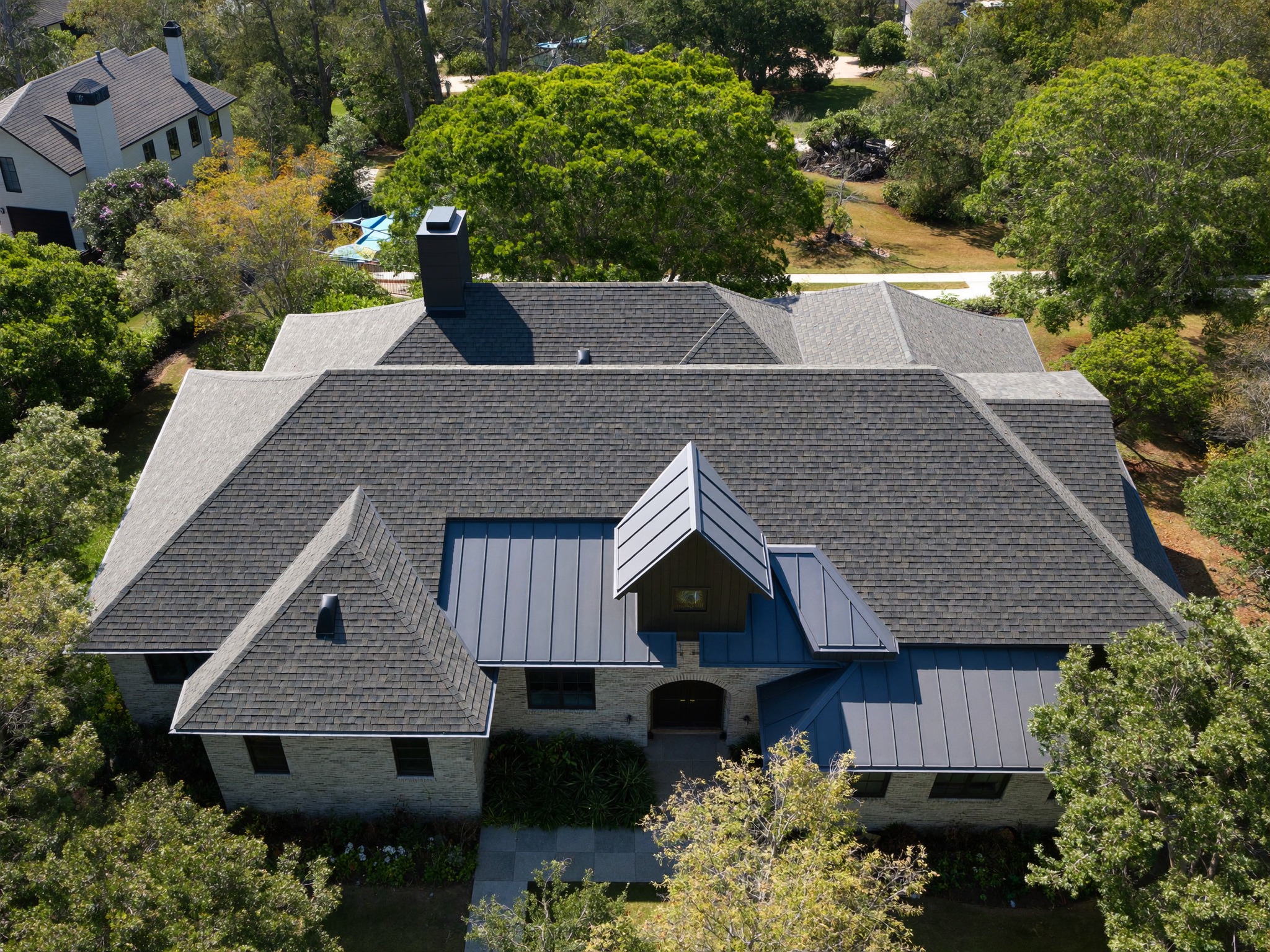 Aerial view of a shingle roof on a Triangle home
